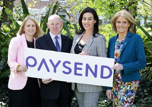 Mary Buckley IDA and three other people holding a Paysend sign
