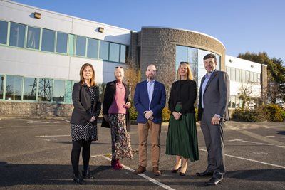 5 Eirgen representatives standing outside HQ