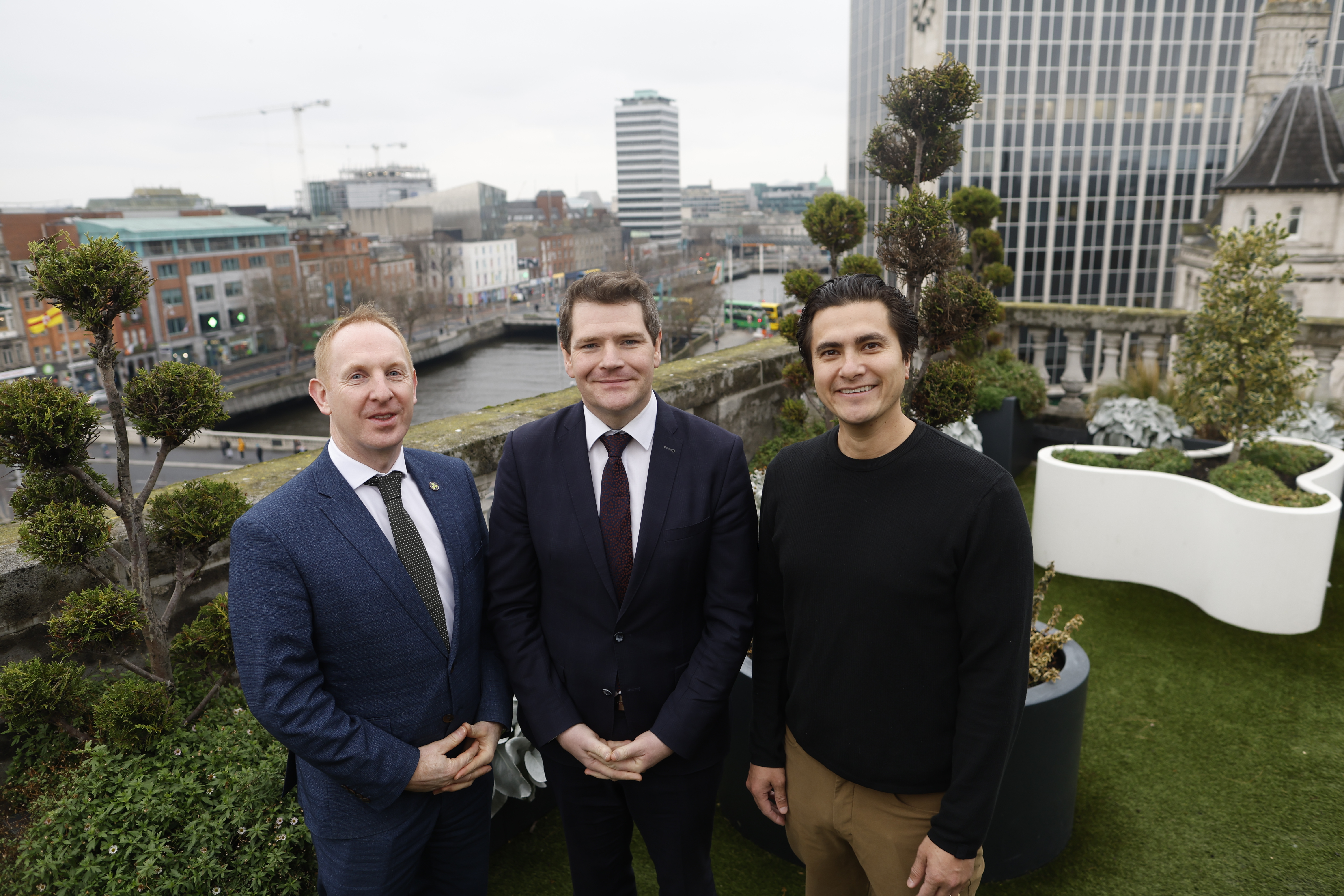 Revenue AI Leader Gong Scales Irish - Three Men Standing Outside With The River Liffey In The Background.JPG